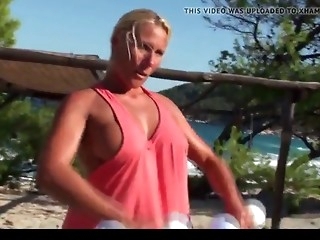 blonde milf working out naked on the beach